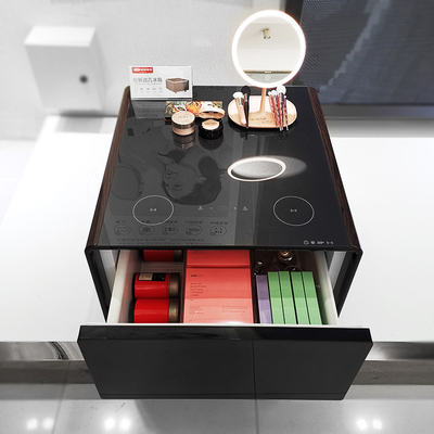 Moderne mini zijtafel met draadloos opladen koelkastladen
