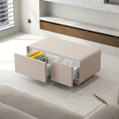 Moderne koffietafel met draadloos opladen en mini-koelkast
