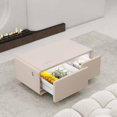 Moderne koffietafel met draadloos opladen en mini-koelkast